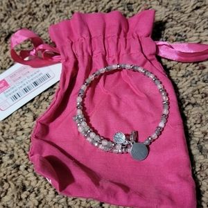 Silver tone 31 beaded charm bracelet